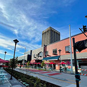 city street with blue skies